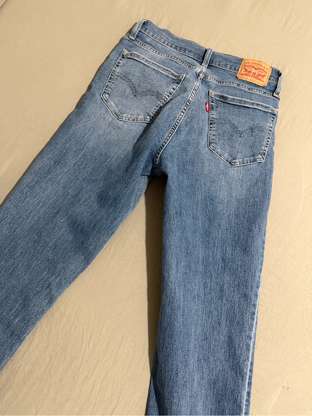 Levi's Women's Light Blue Straight Leg Jeans with Signature Back Pockets